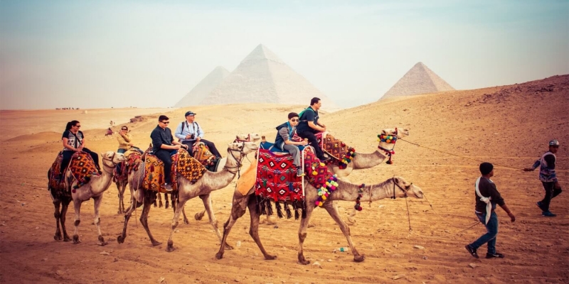 Explore The Sunset or Sunrise at Giza Pyramids By camel or  horse riding 